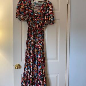 Brand new floral dress with middle slit